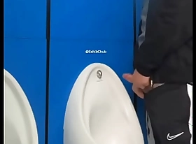 Audacious urinal cum in busy public excrete